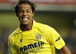 Giovanni dos Santos celebra su gol ante el Valencia. / AFP PHOTO/